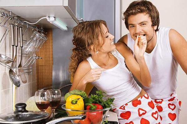 a woman feeds a man products for strength